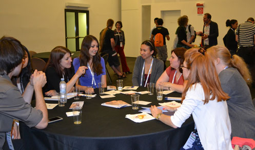 Participants at FENS Forum 2014 Italy sitting at a table