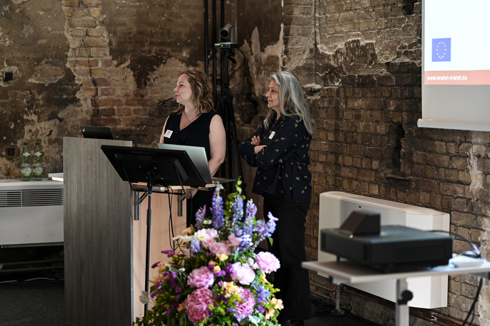 Dr. Tammimies (left) and Dr. Angulo (right) chairing the sysmposium