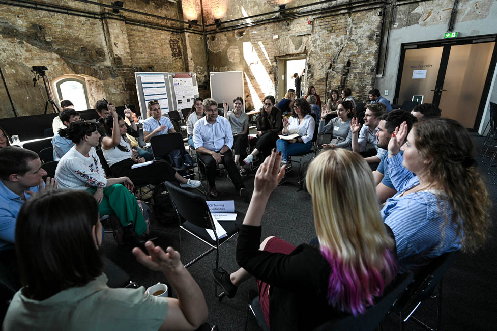 World café discussions, Moderator: Hella Lichtenberg, ERA-NET NEURON Midterm Symposium, May 2024, Berlin. © ERA-NET NEUR